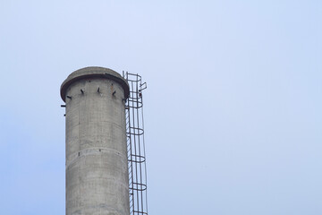 The end of the chimney of a factory.