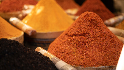 Sacks full of various spices, paprika, cumin, black pepper etc.