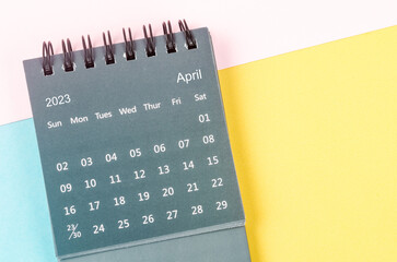 The April 2023 Monthly desk calendar for 2023 year on beautiful background.