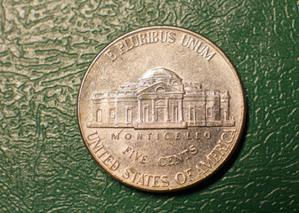 Reverse of a 2008 US 5 cent coin on a dark background.