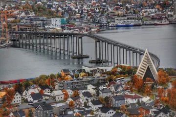 Tuinposter View of the city of Tromso, in Norway from the observation deck Sherpa trappa © Mykhailo