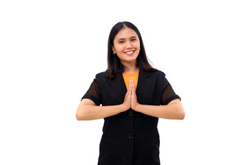 Friendly young asian business woman standing with welcoming or namaste hand gesture. Isolated