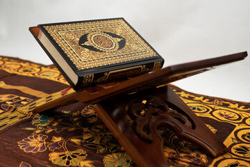 Quran in traditional table isolated