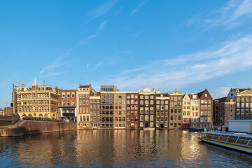 Amsterdam Netherlands, city skyline at Damrak canal waterfront