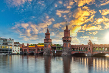 Fototapeta premium Berlin Germany, sunset city skyline at Oberbaum Bridge and Berlin Metro