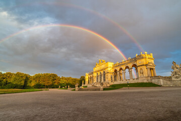 Vienna, Austria - June 24, 2015: city skyline at Gloriette and Schonbrunn garden with rainbow
