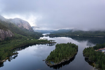lake in the mountains in Norway on a foggy day