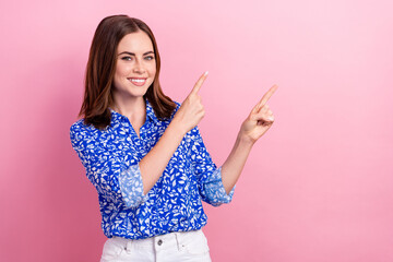 Photo of gorgeous cheerful lady toothy smile indicate fingers empty space isolated on pink color background