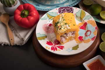 Causa de pescado Sea food ceviche Assorted food plates Peru traditional comfort food buffet table