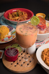 Leche de tigre Sea food ceviche Assorted food plates Peru traditional comfort food buffet table