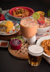 Leche de tigre Sea food ceviche Assorted food plates Peru traditional comfort food buffet table