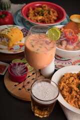 Leche de tigre Sea food ceviche Assorted food plates Peru traditional comfort food buffet table