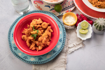 Chicharron de pota chicharron fish sticks Sea food ceviche Assorted food plates Peru traditional comfort food buffet table