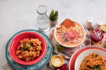 Chicharron de pota chicharron fish sticks Sea food ceviche Assorted food plates Peru traditional comfort food buffet table