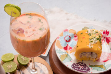 Leche de tigre Sea food ceviche Assorted food plates Peru traditional comfort food buffet table