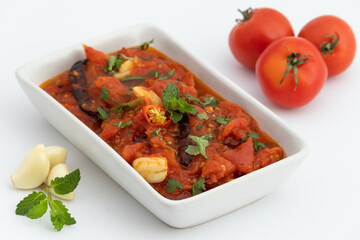 Tangy And Spicy Tomato Chutney Also Called Lehsoon Pyaaj Tamatar Ki Namkeen Chatni Or Chutney Prepared From Fresh Roasted Tomatoes Spiced With Pyaj, Lehsun, Garlic, Pyaaz, Onion Paste And Garam Masala