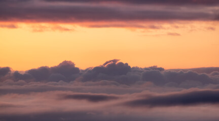 Aerial Cloudscape during morning Sunrise Sky. British Columbia, Canada. Nature Background