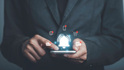 Man using smartphone with bell ringing application notification alert concept. New message, reminder, alarm ,Mail inbox, contact, New product marketing alert.