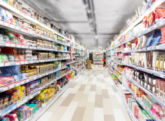 Abstract blurred supermarket.  choosing a dairy products at supermarket.