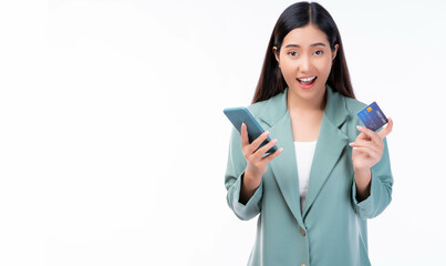 Excited Young asian business woman using mobile phone holding credit card isolated over white background and copy space Surprised Smiling young girl purchasing online through phone using credit card