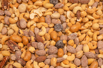 A group of almonds, pistachios, walnuts, macadamia, cashews.