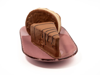 Piece of chocolate cake isolated on white background. A slice of chocolate cake.