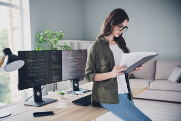Profile side photo of concentrated lady hold paper documents conditions partnership two it...