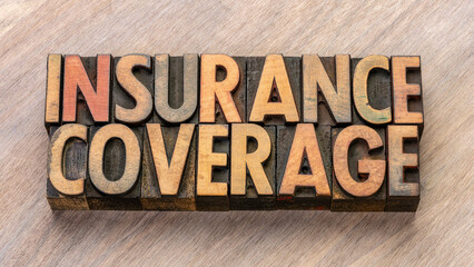 insurance coverage word abstract in vintage letterpress wood type