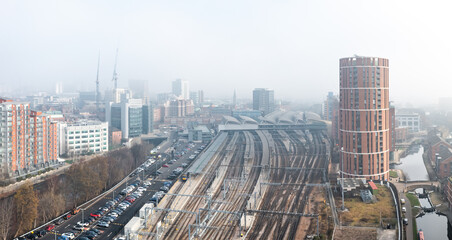 Aerial panorama of Leeds railway station in fog and mist