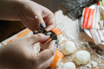 hands of a person with fish