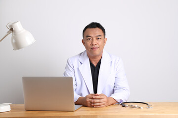 Fototapeta premium Adult Asian Physician