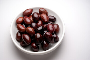 Kalamata black olives  in a dish