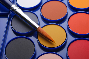 watercolours and brush closeup