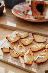 baked quince on a wooden board