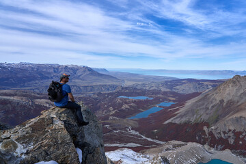 Fototapeta premium man on top of cerro madsen in El Chalten, Patagonia Argentina
