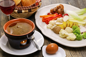 Bagna cauda(Italian Piedmont cuisine)  is a hot dip made from garlic and anchovies. 
The dish is...
