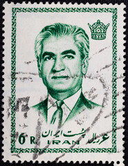 IRAN - CIRCA 1972: A stamp featuring Mohammad Reza Pahlavi, the last Shah before the 1979 Iranian revolution.