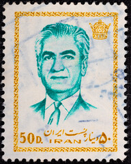 IRAN - CIRCA 1972: A stamp featuring Mohammad Reza Pahlavi, the last Shah before the 1979 Iranian revolution.