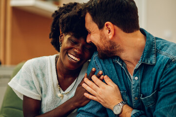 Diverse couple on a therapy session in a psychologist office - Powered by Adobe