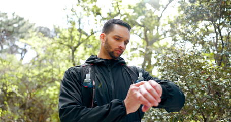 Forest, fitness and runner man smartwatch check for health stats or gps technology in Canada....