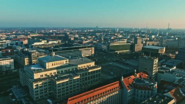 Drone shot revealing Leipzig Opera house (Oper Leipzig) at sunset