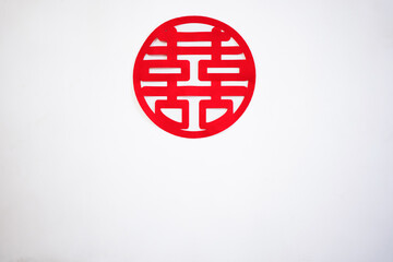 Double happiness sticker stick on the isolated white background  to represent the happiness in a...