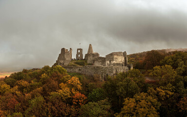 Fototapeta na wymiar Doba castle in Somlo hill Hungary. Amazing monument fort ruins from Middle age. Amazing fall colored landscape.