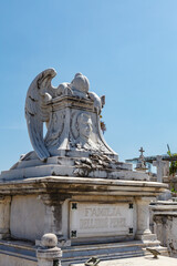 Obraz premium Rich decorated grave with a mourning angel statue at the Santa Ifigenia Cemetery in Santiago de Cuba, Cuba, Caribbean
