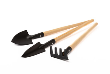 Garden tools isolated on white background. Garden shovel and rake.