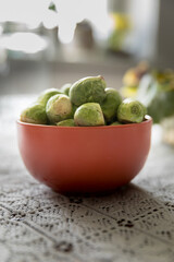 Brussels sprouts in a clay pot, healthy vegetables.