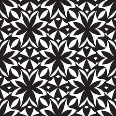 The geometric shape of the tile repeats in a monochrome pattern, creating a mesmerizing silhouette of diagonal lines; a perfect blend of nature's blossom and modern technology