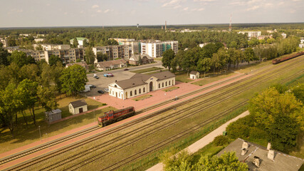 Drone photography of train locomotive waiting at station