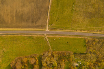 Drone photography of top view road through agriculture land
