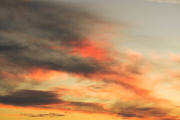 Cirrus clouds sunset sky landscape with beautiful and vivid color.